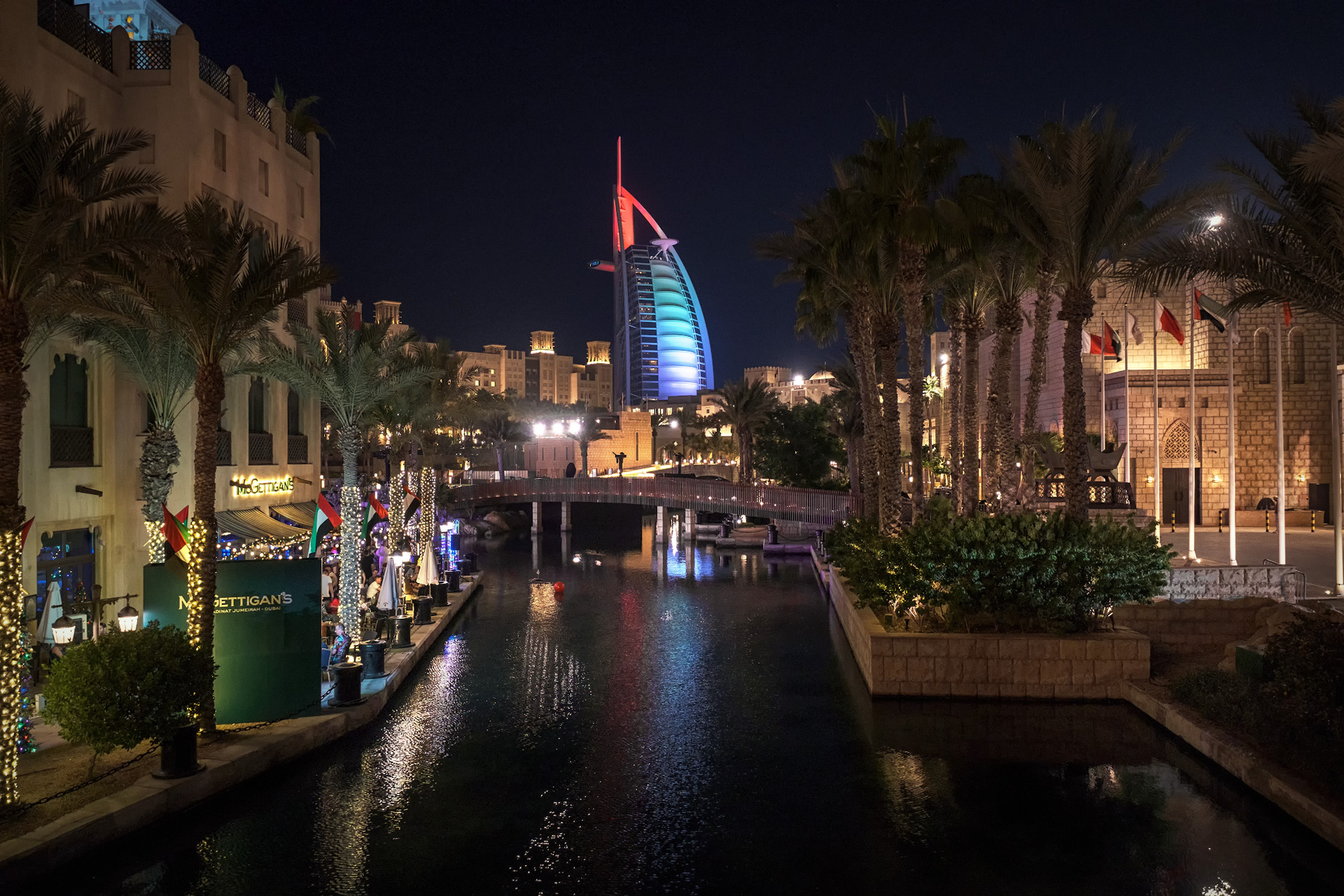 Burj Al Arab In UAE Colors BurjAlArab night dubai water lights city skyscraper landscape cityscape scenery travel outdoors uae chizh