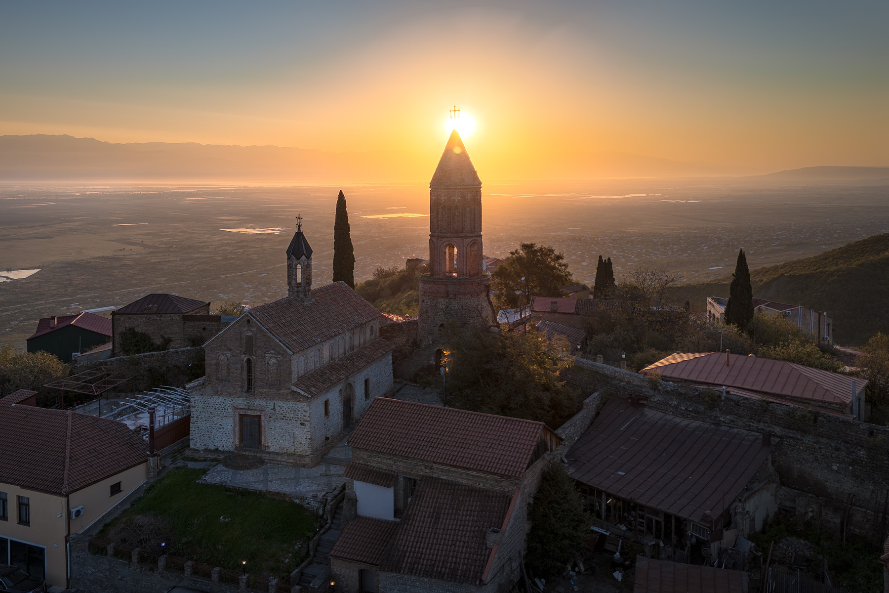 Sunrise Over St. George basilica In Sighnaghi sighnaghi church sun sunrise down basilica morning sunlight kakheti valley landscape citiscape scenery travel outdoors georgia sakartvelo chizh