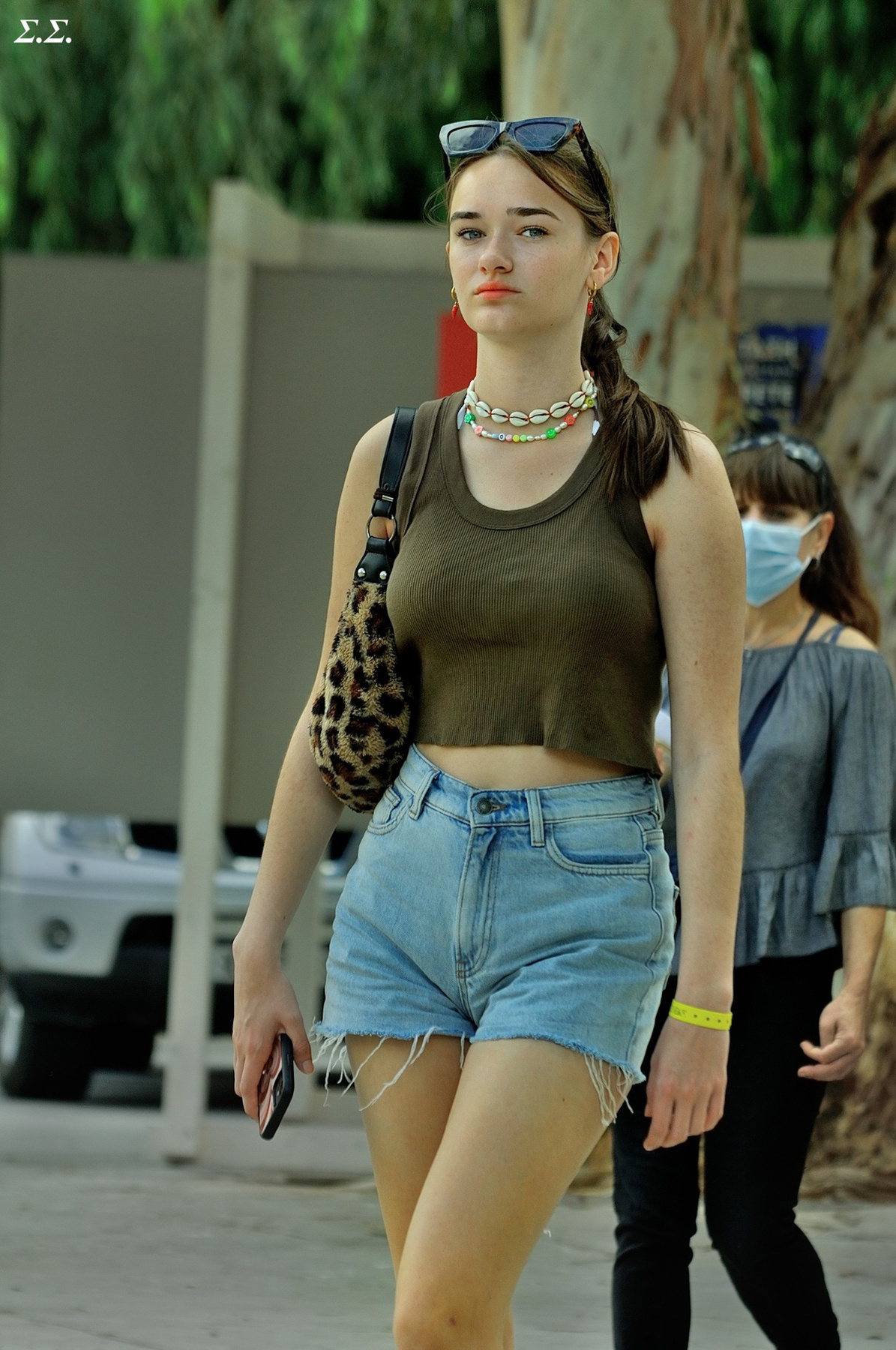 THE GIRL WITH THE SHELL NECKLACE 