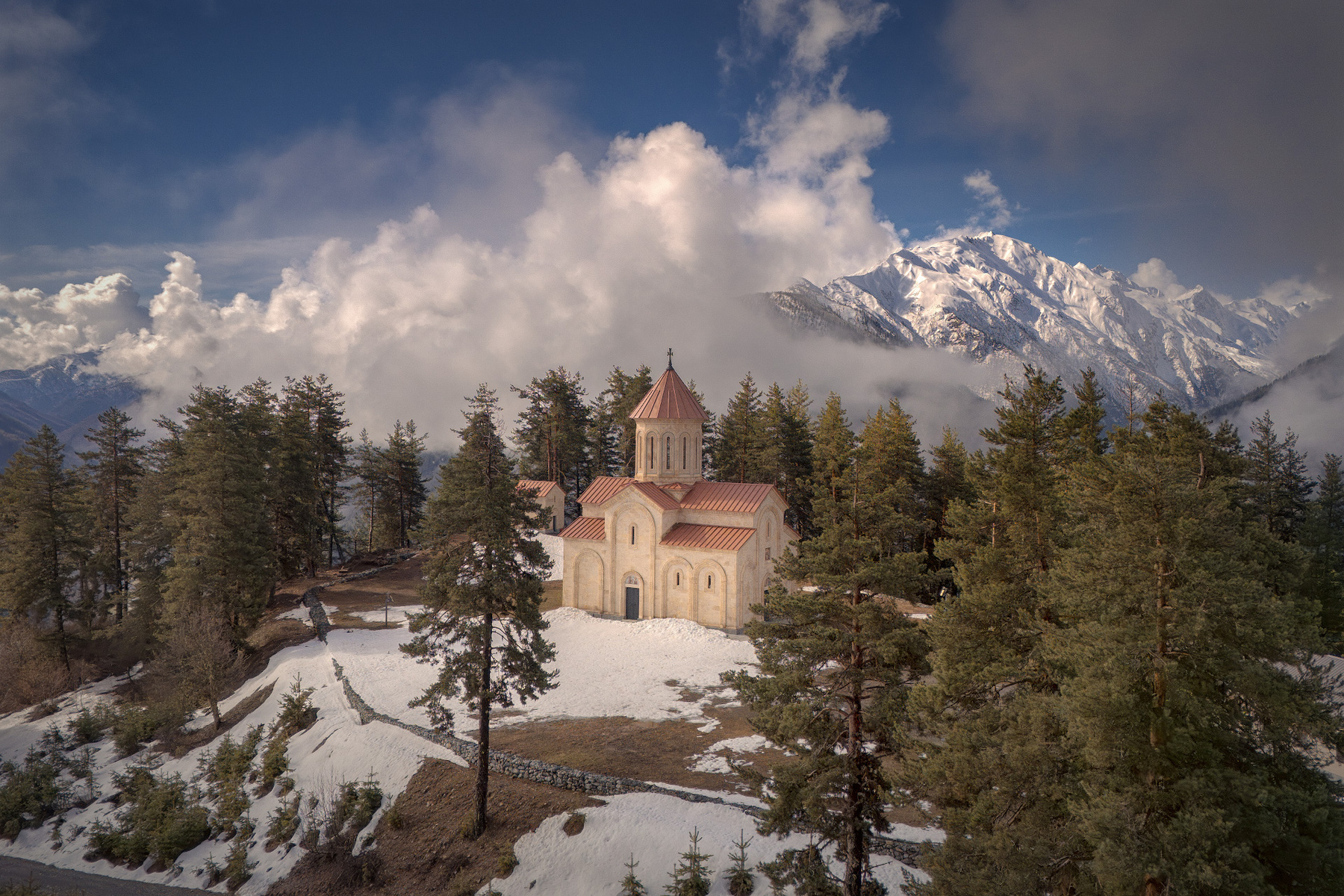 Temple On The Mountain svaneti tsvirmi spring church clouds trees mountain fog sky nature landscape scenery travel outdoors georgia sakartvelo chizh
