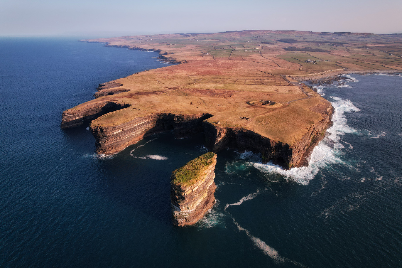 ...scenic peninsula... ireland drone nature outdoors downpatrick dun briste aerial scenic epic spectacular picturesque europe landscape atlantic ocean sea cliffs irish coast coastal scape
