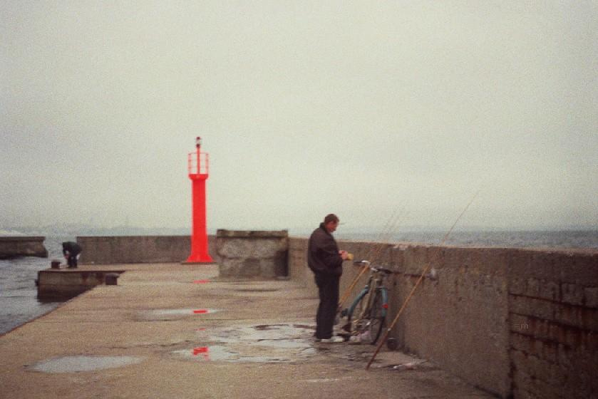 золотую рыбку tallinn, estonia, baltics, rainy, sea, fisherman