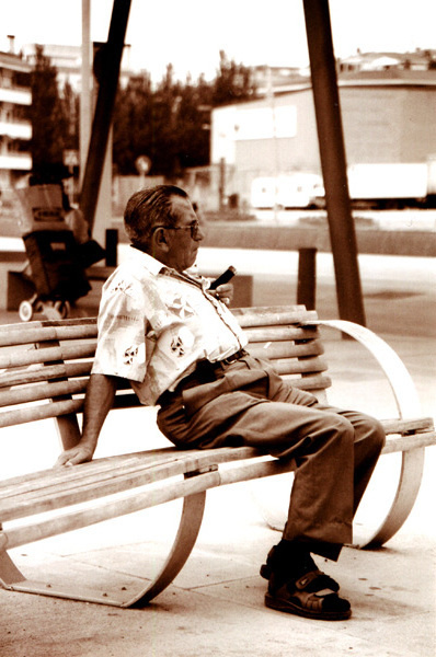 Old man is listening radio 