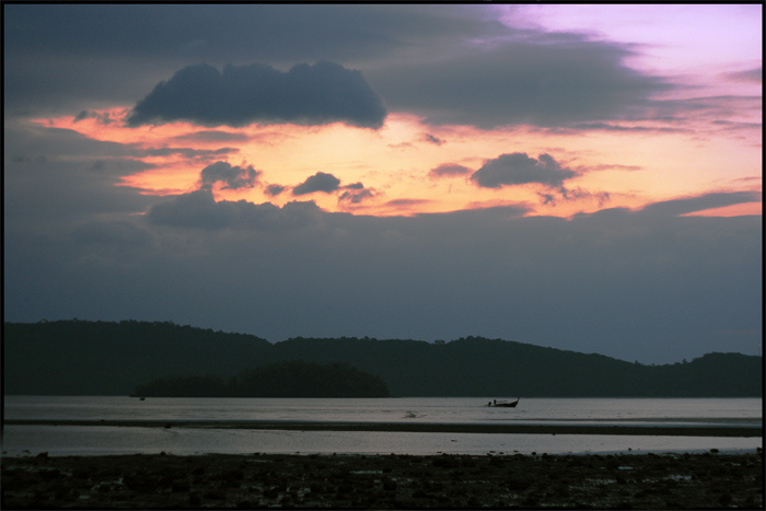 Lost boat sunset boat sea clouds