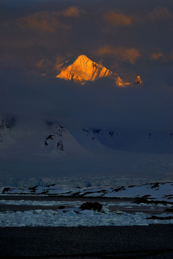 Antarctic sunset: Shackleton in clouds Anatrctica Vernadsky station Shackleton sunset clouds