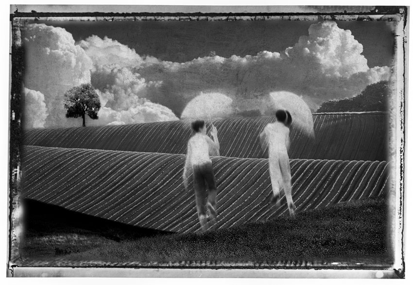 Umbrella as the sun in clouds 