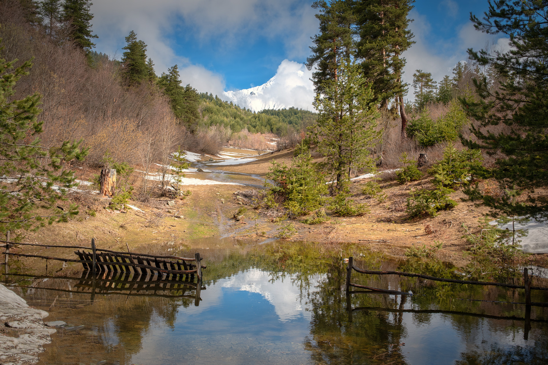 Spring Puddle svaneti tsvirmi spring stream puddle water reflection trees fance mountains clouds sky nature landscape scenery travel outdoors georgia sakartvelo chizh