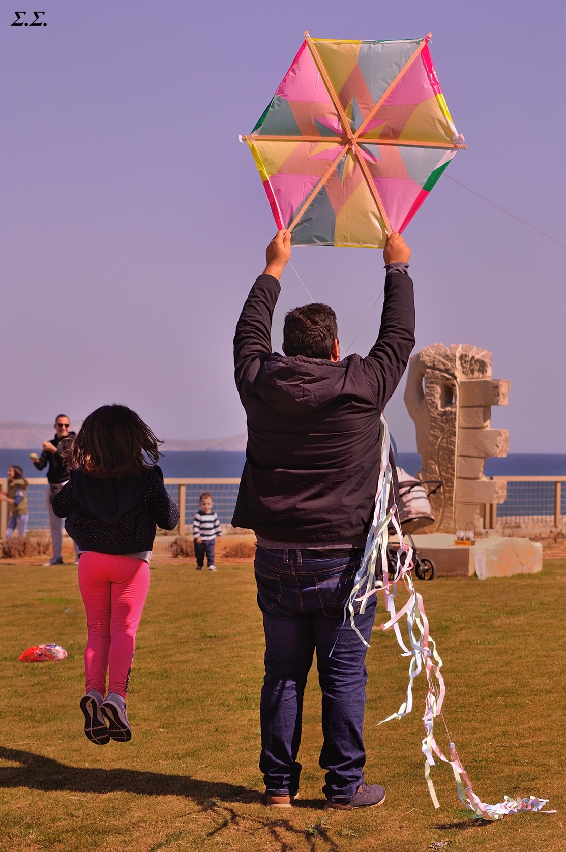 KITE FLYING AND THE EXCITED GIRL 