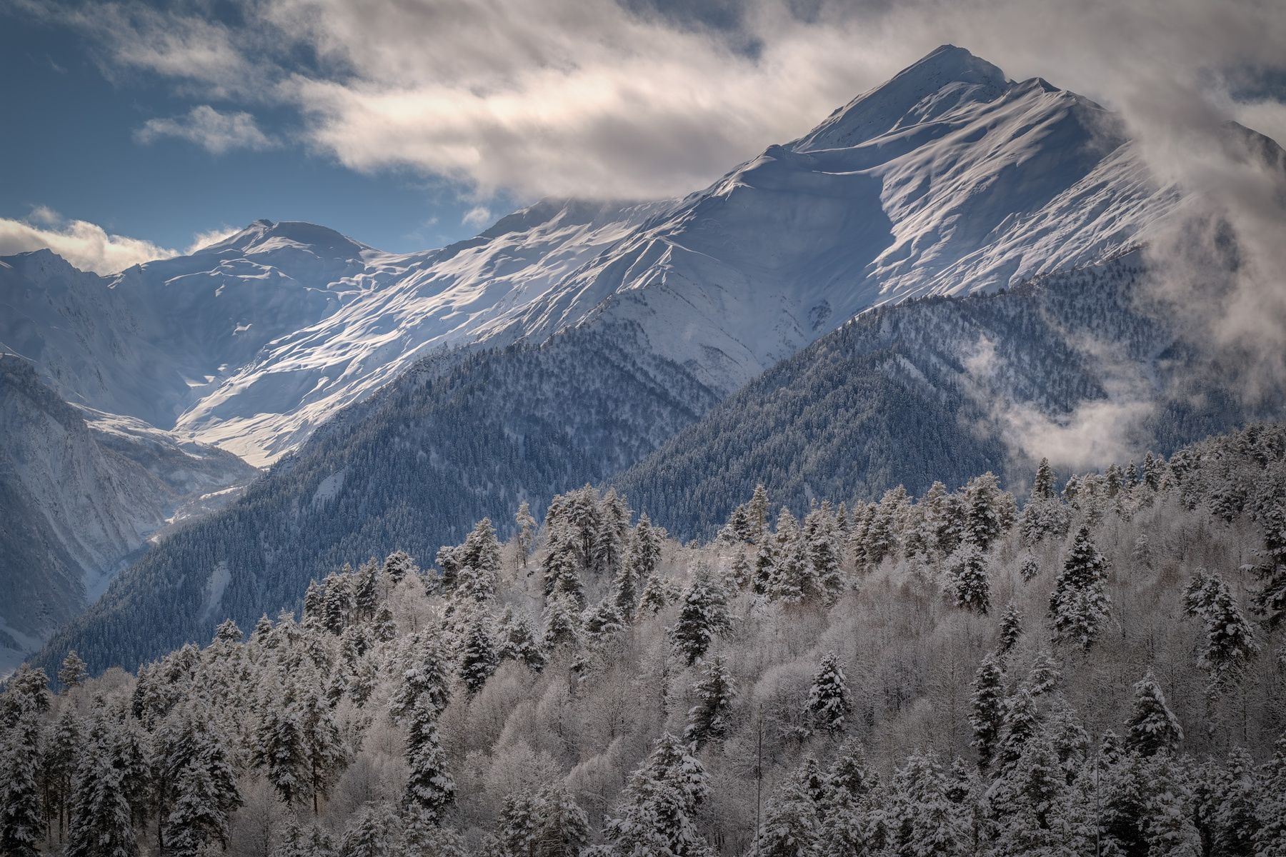 Mountains Around Tetnuldi svaneti tetnuldi mountains snow winter trees peaks clouds january nature high landscape scenery travel outdoors georgia sakartvelo caucasus chizh