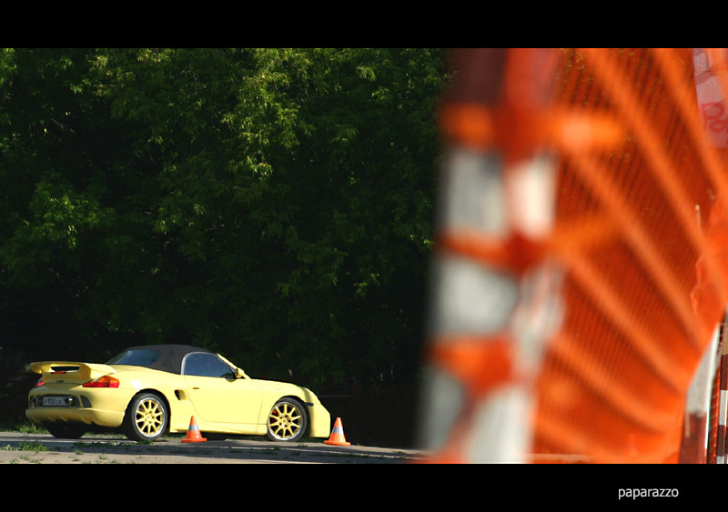 yellow porsche boxter