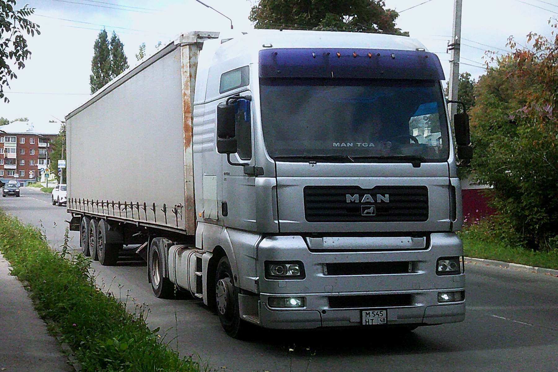 MAN MAN авто тягач улица город осень