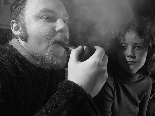 They are smoking трубка, дым