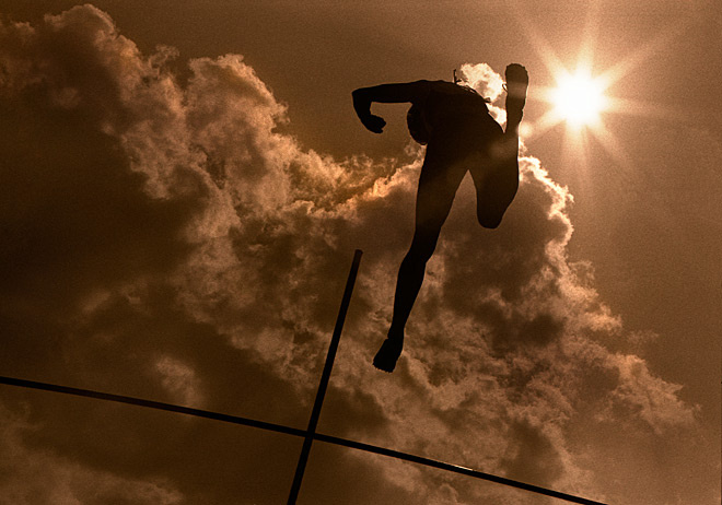 Over the clouds jump, sun, abstract