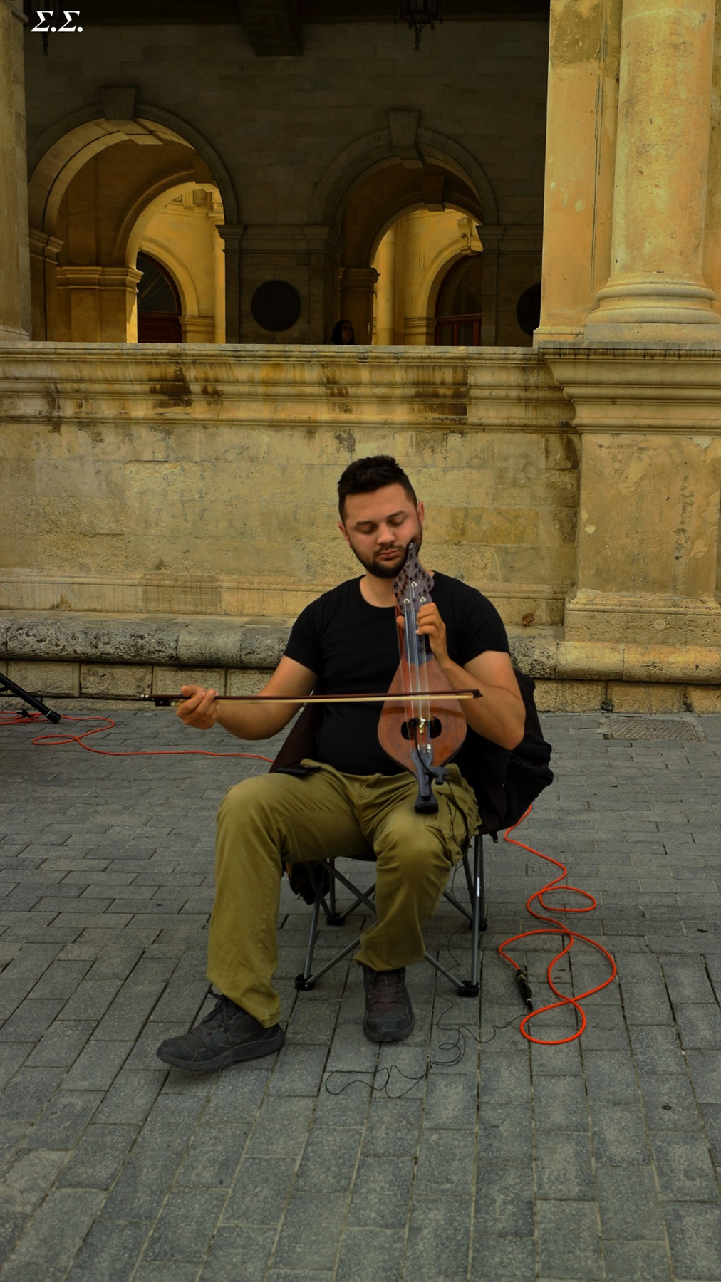 META-POSTMODERN CRETAN FOLK MUSICIAN 