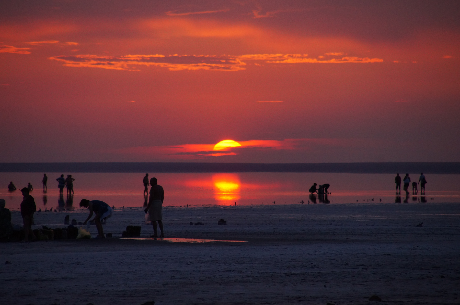 Bloody sunset over a salt lake 