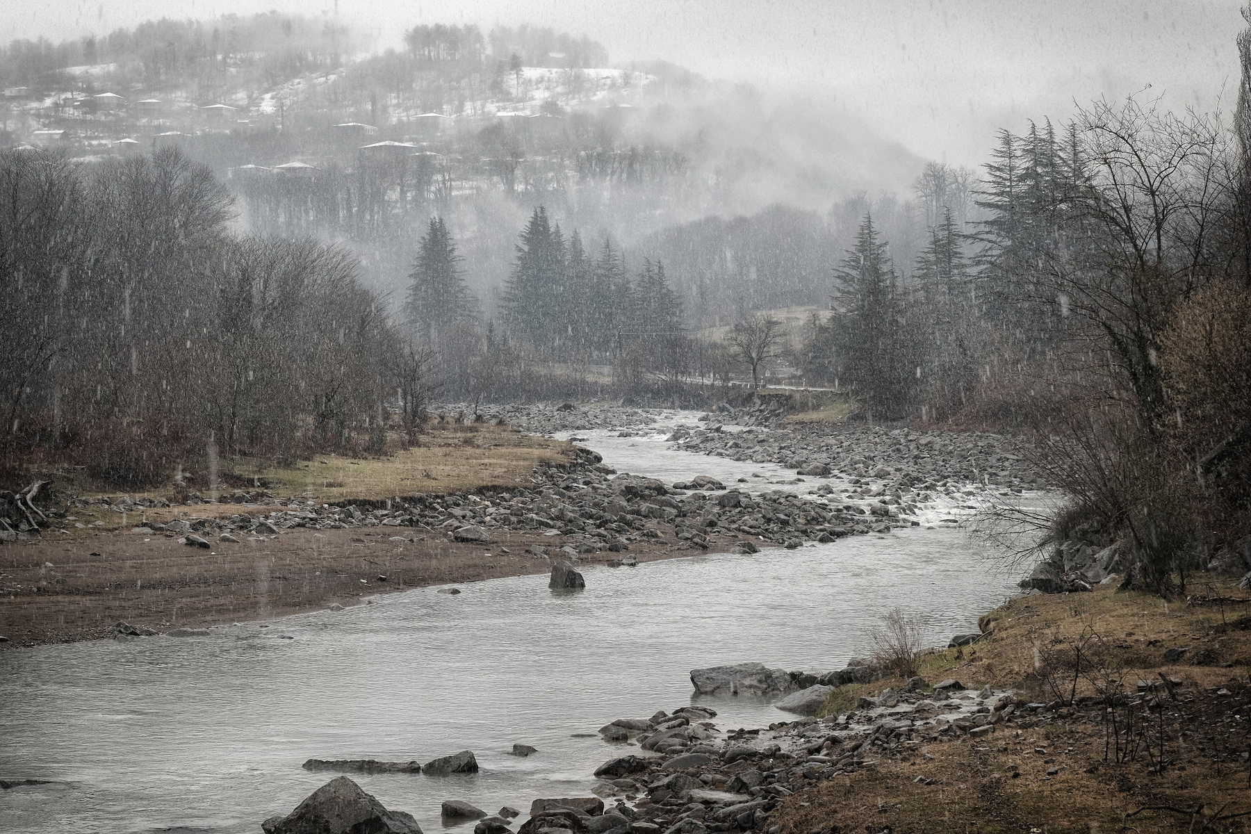 Snowfall In Mountains snowfall river february imereti kursebi village tskaltsitela overcast clouds winter forest mountains landscape scenery travel outdoors georgia sakartvelo chizh