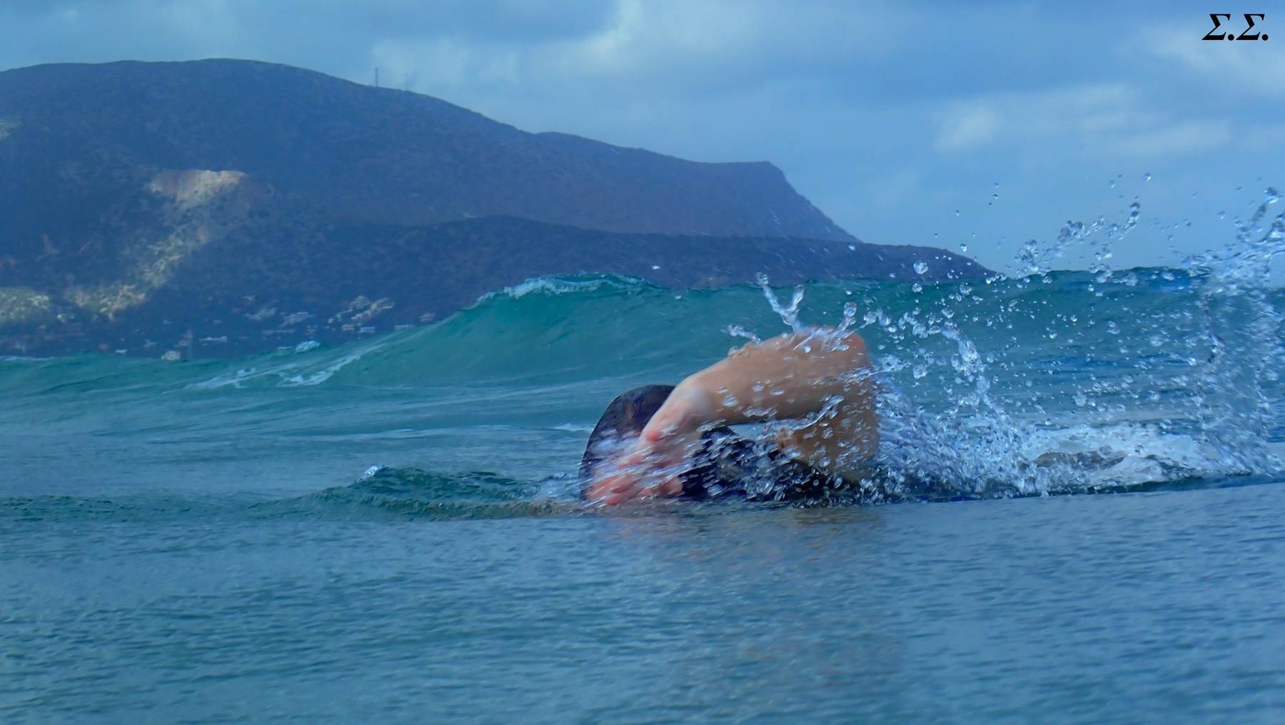 SWIMMING IN THE RAGING  WAVES 