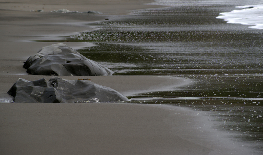 Two stones, sand