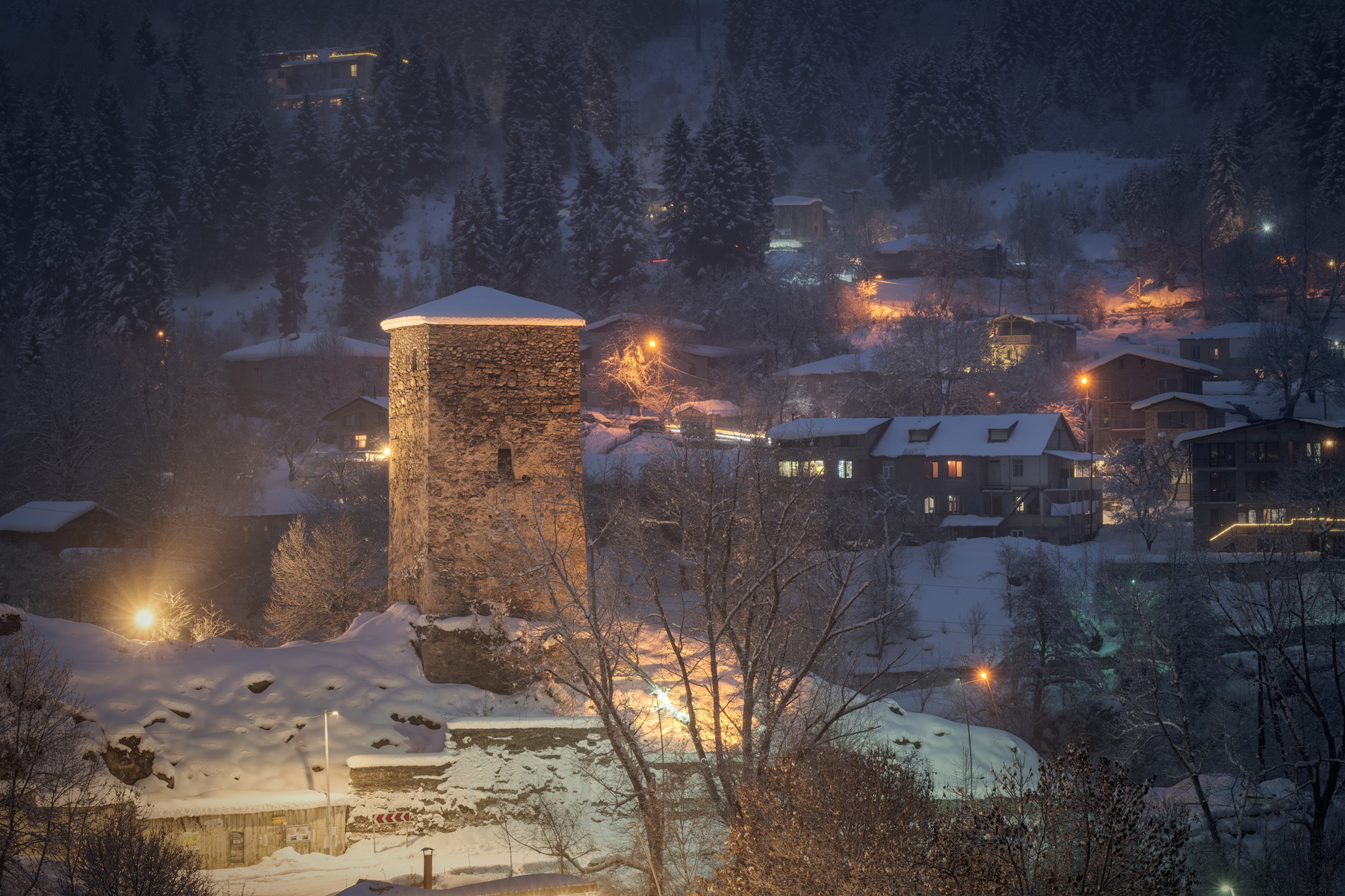 Svan Tower Under Snow svaneti mestia town night tower lights winter twilight mountains high landscape scenery travel outdoors georgia sakartvelo chizh