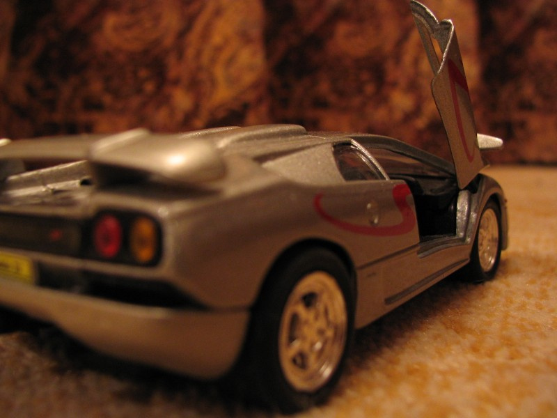Подвезти? Lamborgini авто макро суперкар