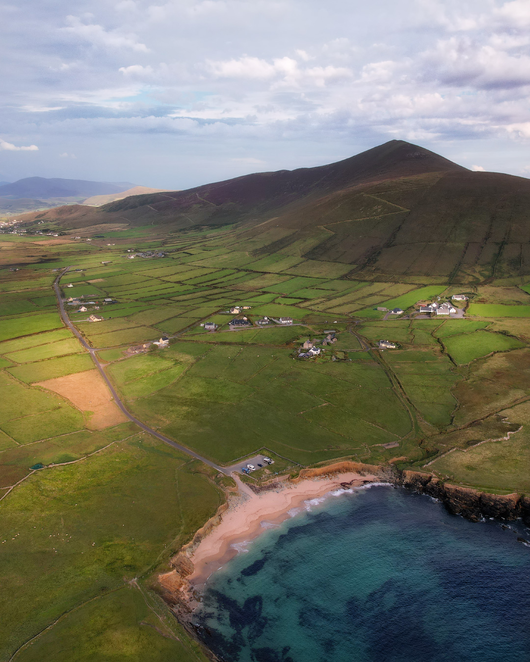 ...emerald lands... ireland nature outdoors scenic wild atlantic way dingle peninsula clogher strand rural country side aerial from above mountains picturesque kerry europe landscape seaside coast shore beach